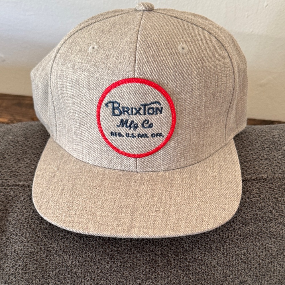 Brixton Light Tan Cap with Red Emblem
